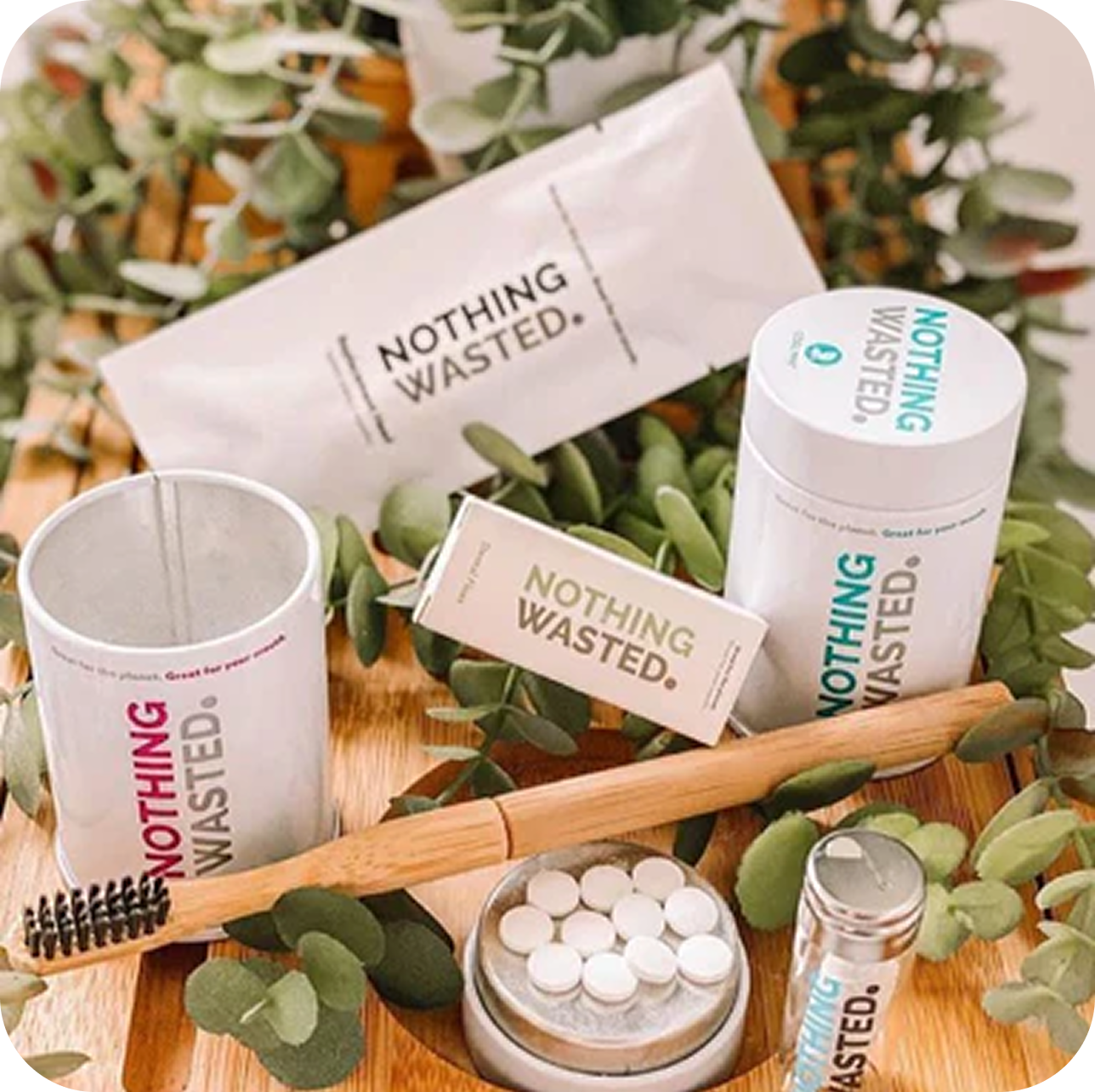 NoWa product flat lay with toothbrush and tablets